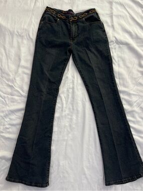 High-Rise Black Flare Jeans with Decorative Waist Detail
